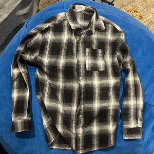 Women’s flannel shirt.